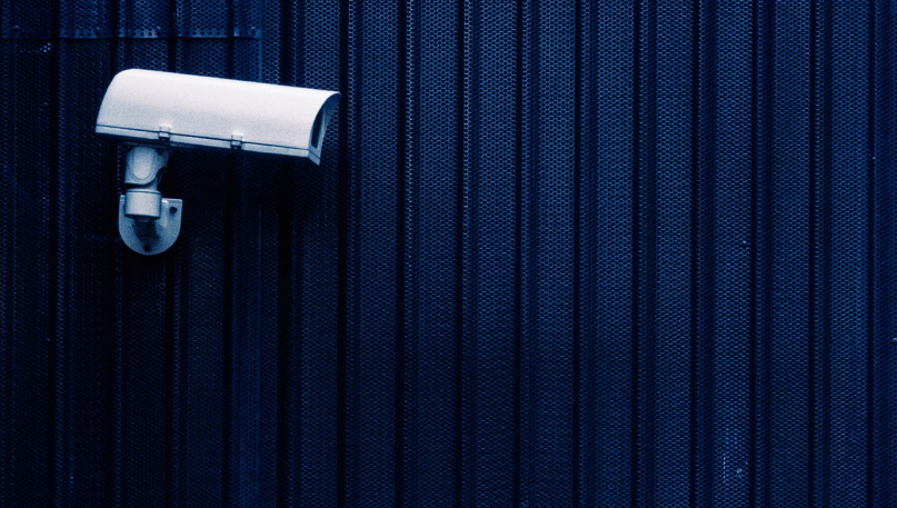 two men taking inventory inside of warehouse
